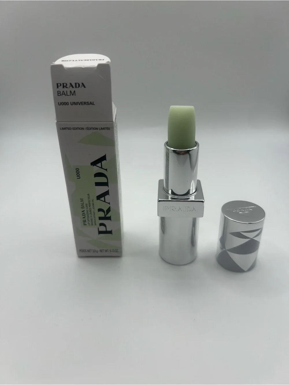 Prada Lip Balm U000 Universal in Pale Green with Silver Case